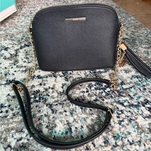 ALDO Black Crossbody Bag with Gold Chain and Tassel